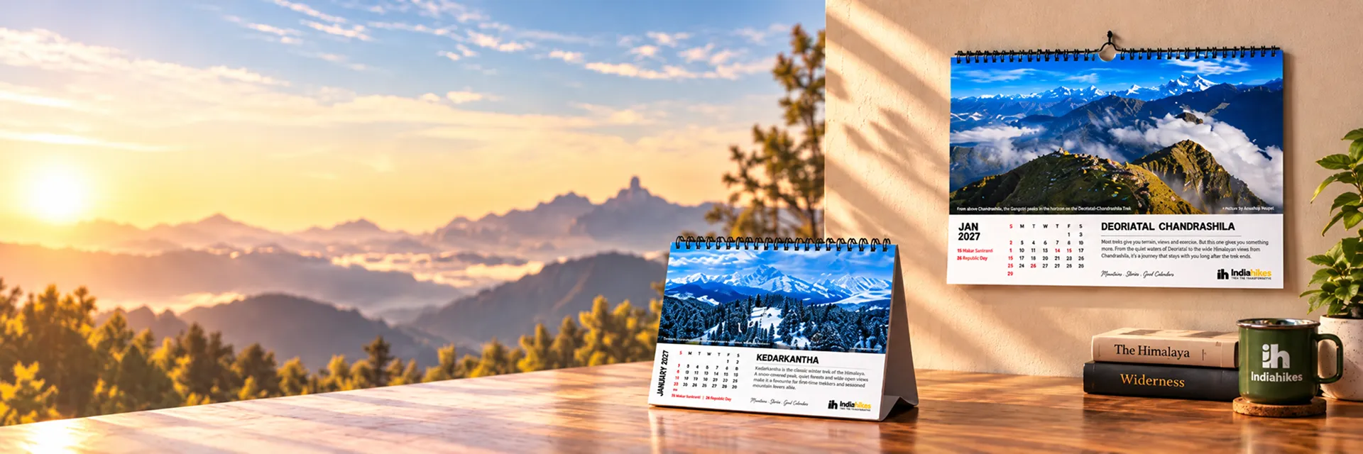 Wall and desk editions of the Mountain Lovers Gold Calendar, with The Himalaya and Wilderness books and an Indiahikes mug
